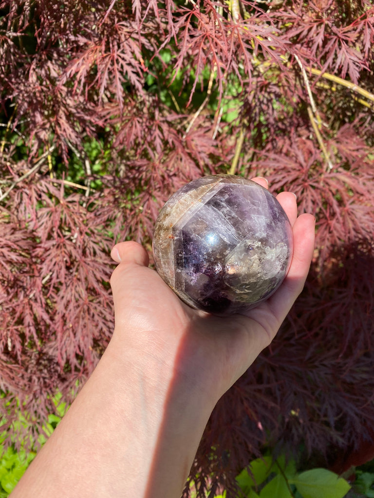 Super 7 Crystal Sphere 7 Minerals back