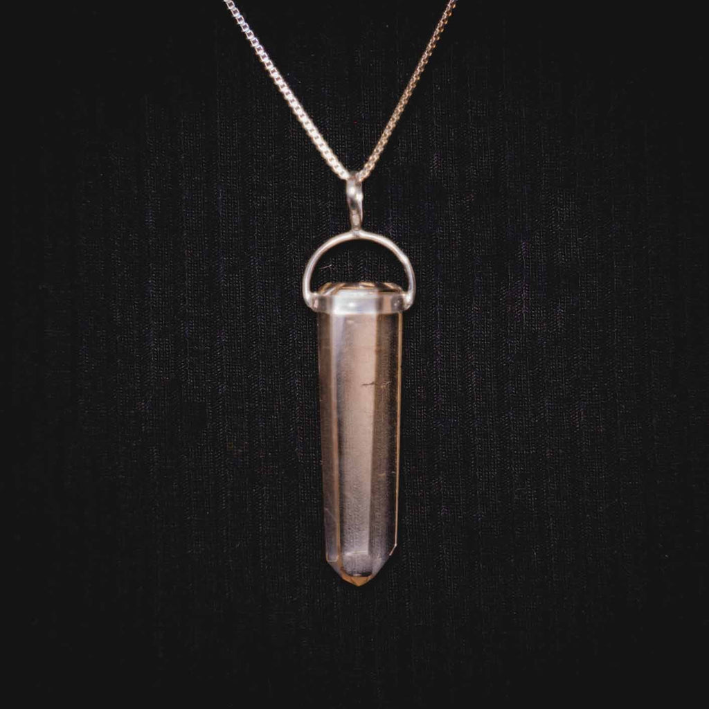 Citrine Cryystal Point Necklace. it is a stone of joy and abundance. Pendant comes on an 18 inch .925 Sterling Silver Rhodium plated chain so it wont Tarnish. Each pendant measures approximately 1 inch.