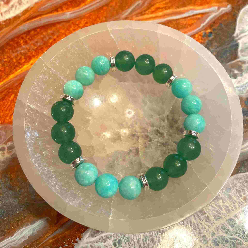 You are viewing an Amazonite and Aventurine Bracelet and Selentite Bowl Set. Size of gemstones: 8mm Comes with Round Selenite Bowl to keep it safe!