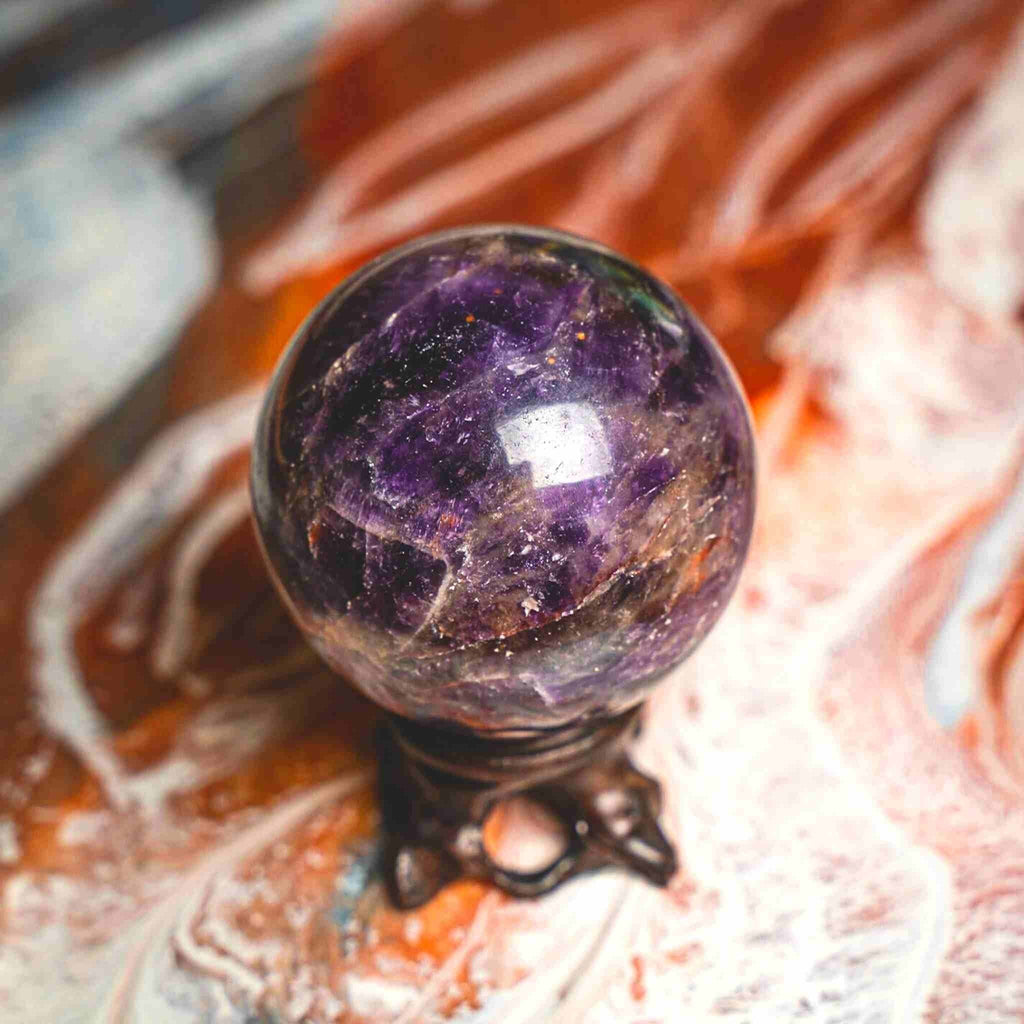 Chevron Amethyst Crystal Spheres (2 Sizes Available) Large sphere is deeper purples Weight: 2&quot; in diameter and weight is.32K Medium sphere is a little lighter shades of lavendar: 1 3/4&quot; in diameter. Weight: .32K