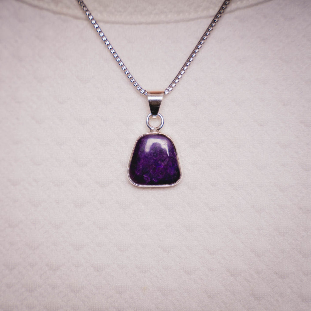 You are viewing Sugilite Pendant Necklace - Sterling Silver 925 Stamped Eye Ring Sugilite Polished Stone Crystal Jewelry Gemstone.Includes Sterling Silver .925 Chain, 20 inch Rhodium plated chain which will not Tarnish 1.3mm Sugilite Polished Stone.