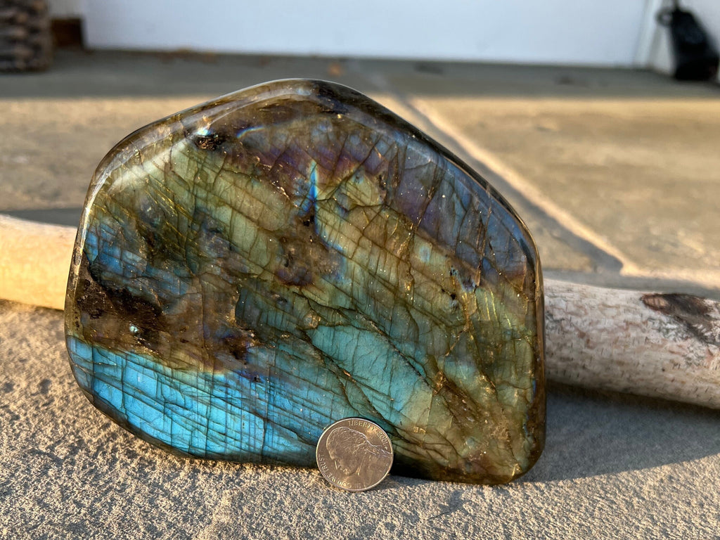 This beautiful Labradorite Freeform is AAA Quality Natural Polished Hand Carved Crystal. Labradorite is an Anti-Anxiety and stress reliever, and used to expand awareness, intuition and creativity.Size: 5 x 4 x 2 Weight: 1.35 kg, 2.98 lbs