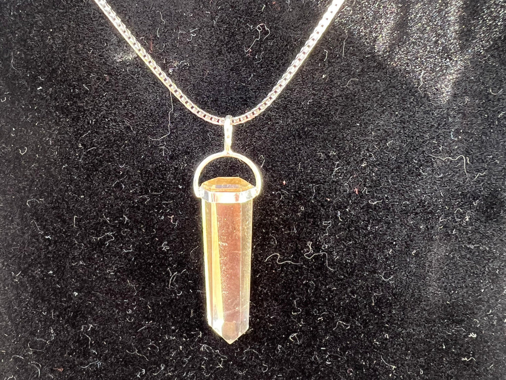 Your citrine pendant is set in sterling silver hanging on an 18 .925 Sterling Silver Rhodium Chain. . It is a very high quality and versatile chain. Each pendant is unique and measures approximately 1.5 to 2.