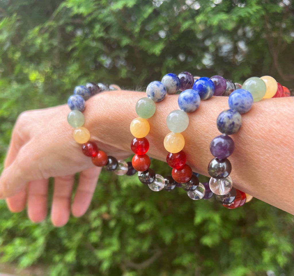 High Grade Stretch Crystal Stone Chakra Bracelet (High Quality 10MM stones) These energy bracelets are called Chakra Healing Bracelet and is designed with seven different colored crystals.